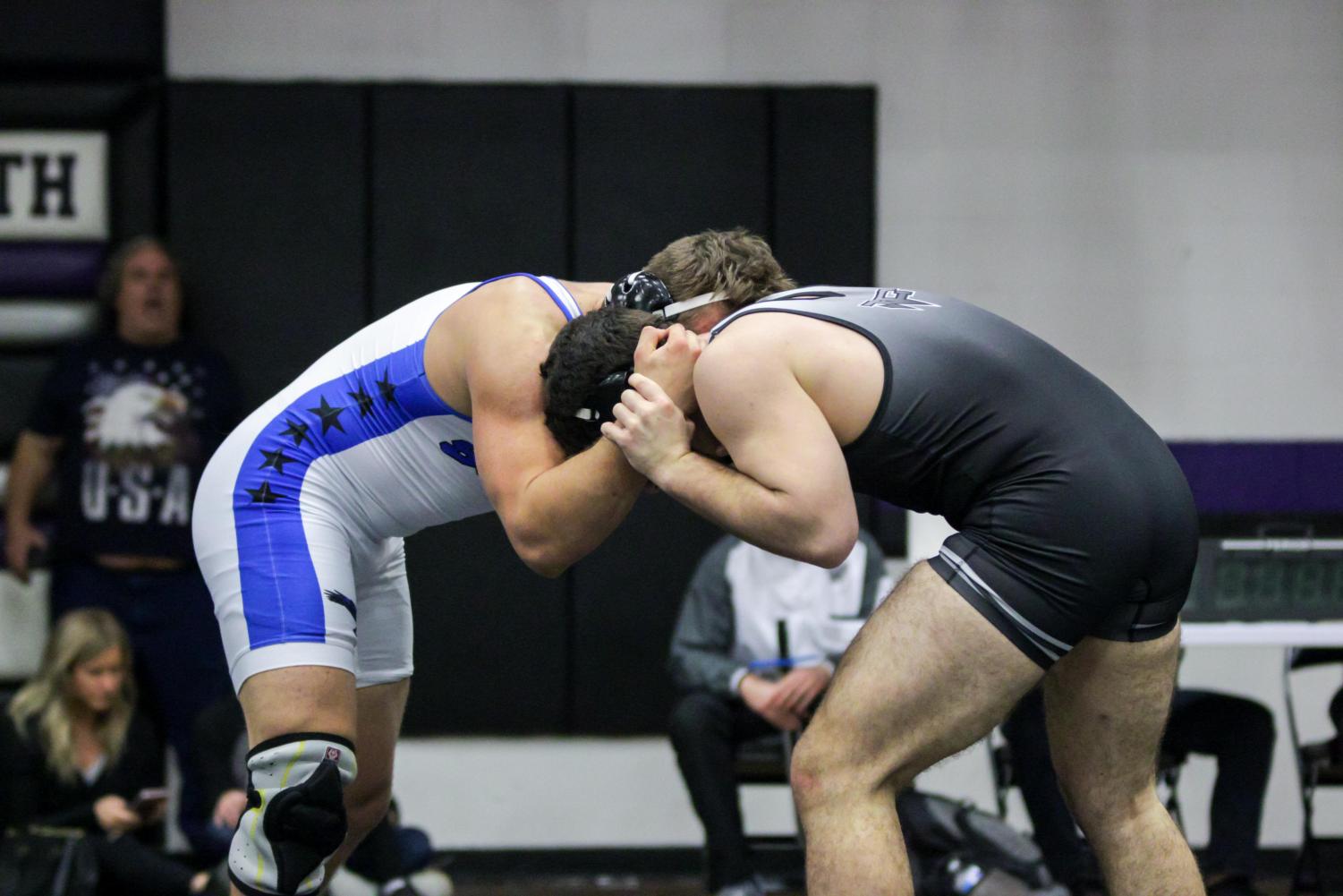 Wrestlers prepare to take on teams during the state tournament.