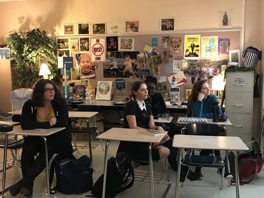 Erin Maley, Carly Bachism, Jordyn Paul-Slater, and Maiwenn Loheac engage in a Wednesday Habitudes lesson in Mr. Thompsons IB Literature class. Mr. Thompson infuses his Habitudes lessons with knowledge from his TOK class. 