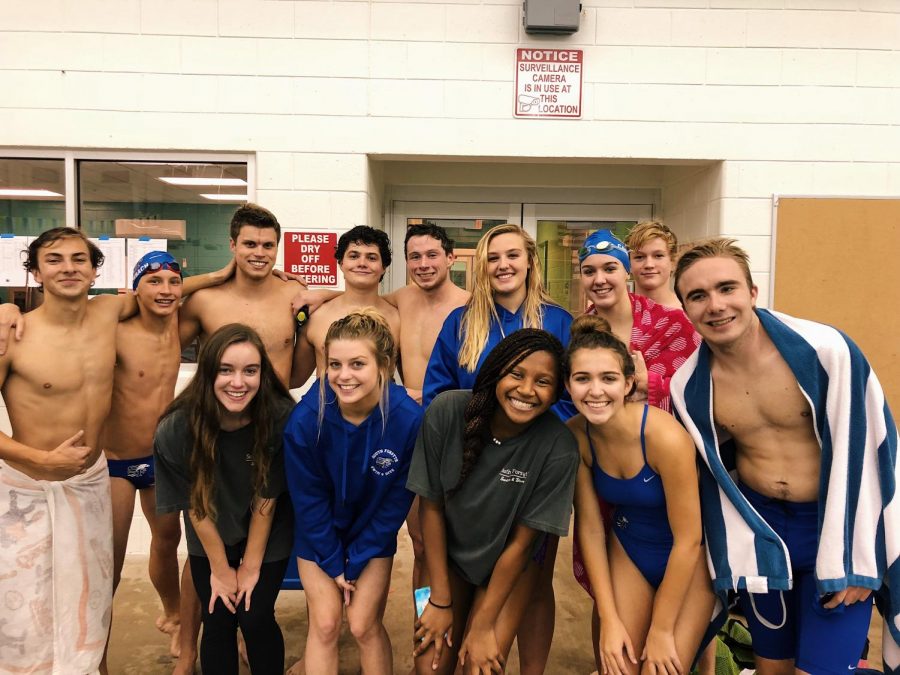 Swimmers (Top Row: left to right- Will Thomas,  Daniel Eberbach, Cooper Gilson, John Ryan, Charlie Hale, Jessica Fisher, Courtney Carden, Jonathan Burt, and Matt Strong. Bottom Row: left to right- Maddison Riner, Reese Hammond, Kelsey Henry, and Caroline Carden) get together for the first swim meet of the sofo swim season. 