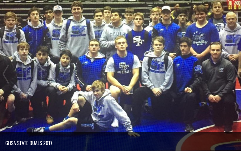 +This+was+taken+at+the+GHSA+2017+state+duals.+The+team+stands+posing+and+exciting+for+the+tournament+that+awaits+for+them.
