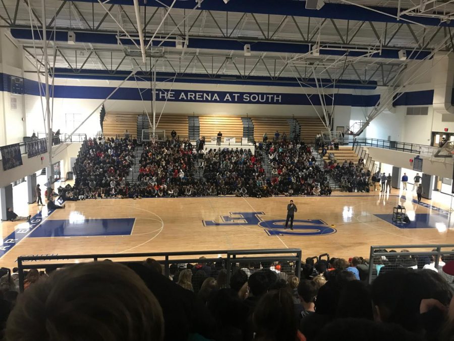 Speaker Logan Weber opens up his presentation about setting and reaching goals in Souths Arena this morning. The Arena was packed with students, forcing the faculty to move the projector and screen  back and adjust the speakers rotation.  