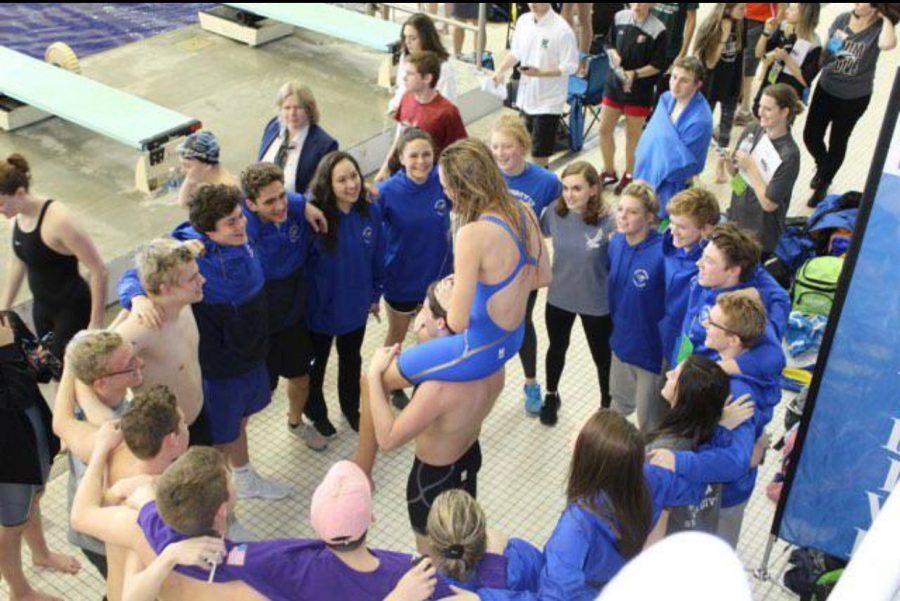 The state qualifiers prepare for the last team cheer of the season. 