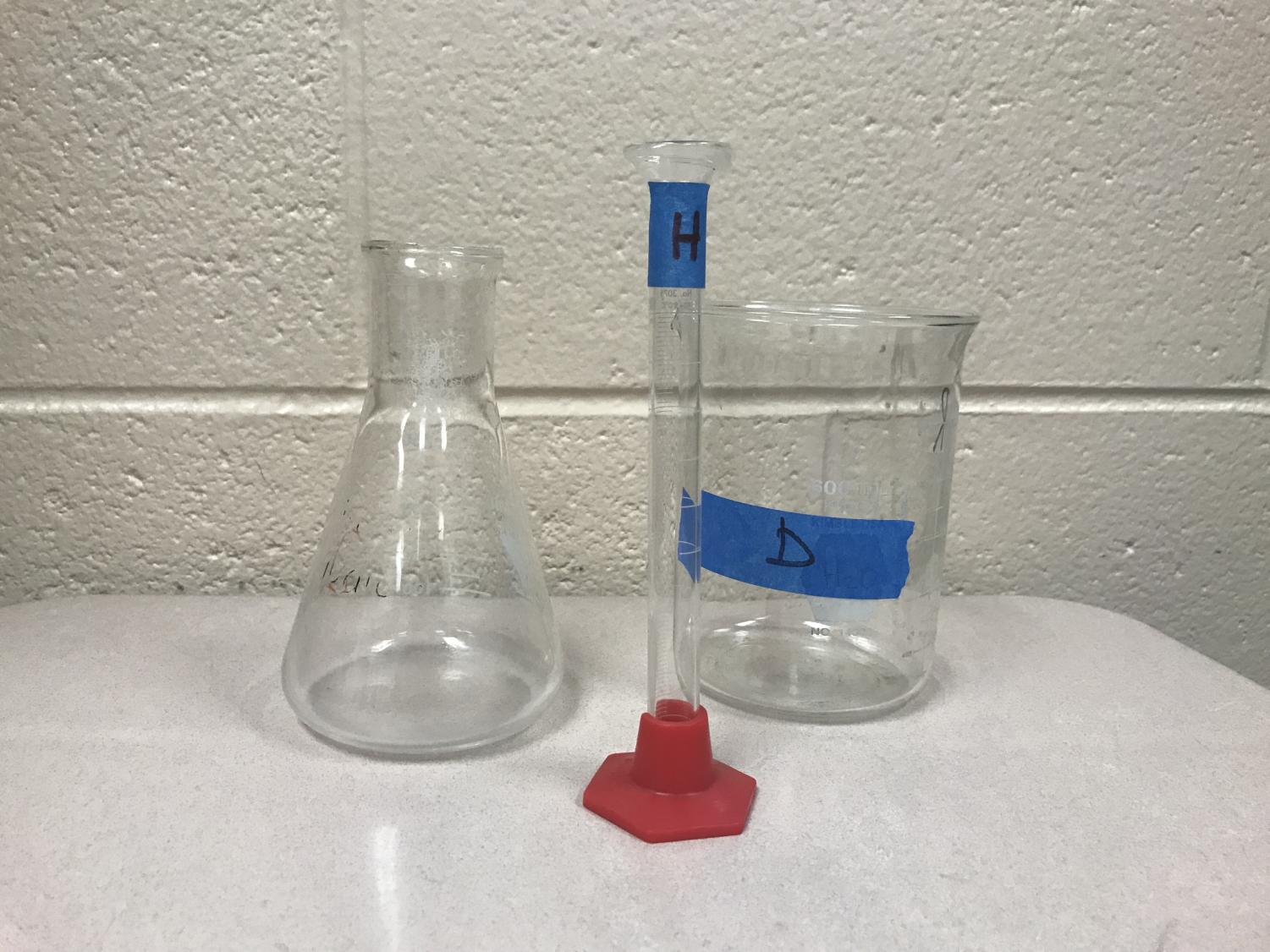 Students practice for hands on lab events with supplies such as beakers and test tubes before their competitions.