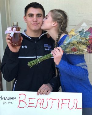 Jared Honey poses for a picture with his date to prom, Hannah Hausler. He asked her on her birthday, which made the day extra special to remember. The two have been dating for a year and are excited to go to prom together for the second time.