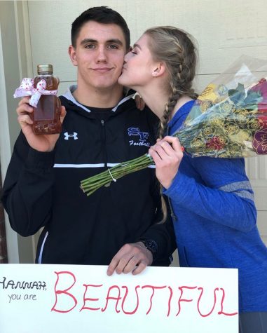 Jared Honey poses for a picture with his date to prom, Hannah Hausler. He asked her on her birthday, which made the day extra special to remember. The two have been dating for a year and are excited to go to prom together for the second time.