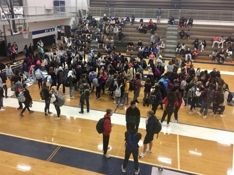 Students from South participated in a controlled walkout to the Blue and Silver gyms to rally for additional school safety measures. 