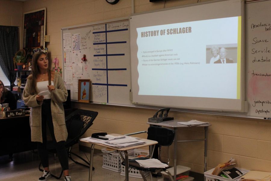 German foreign exchange, Lara Herrmann, gives a presentation to the journalism class on the popularity of Schlager Music in Germany.  