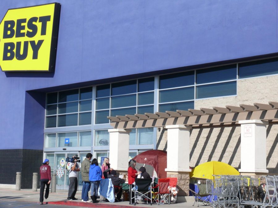 Early campers. During Black Friday, people come early and camp outside the store to be one of the first people inside the store when the sale begins. Black Friday begun many years ago, and it is a day where everyone shops for special deals or items.