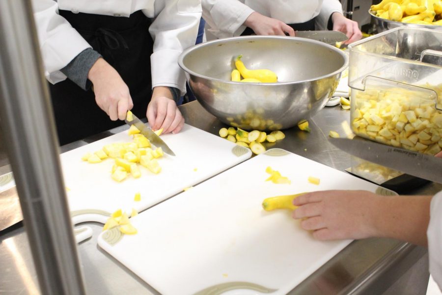 Seasonings greetings. South Forsyth High School culinary students work in the kitchen to prepare meals for Thanksgiving. Each meal is specially prepared and labelled with each ingredient and allergen. We list the top ten allergens, Chef Martin said, and if they have any other concerns, we address those too.