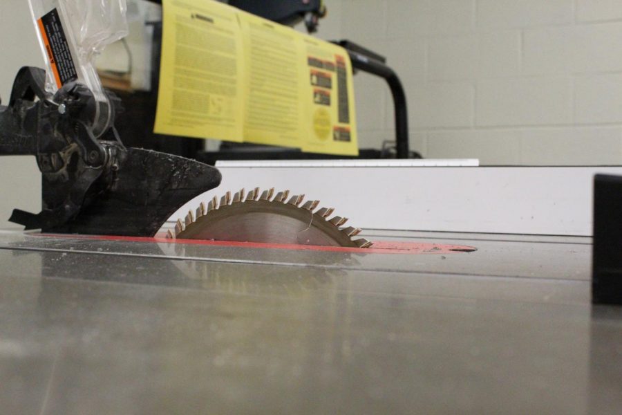 Common tools. The table saw is patiently awaiting to be used by many eager students ready to work on their projects.