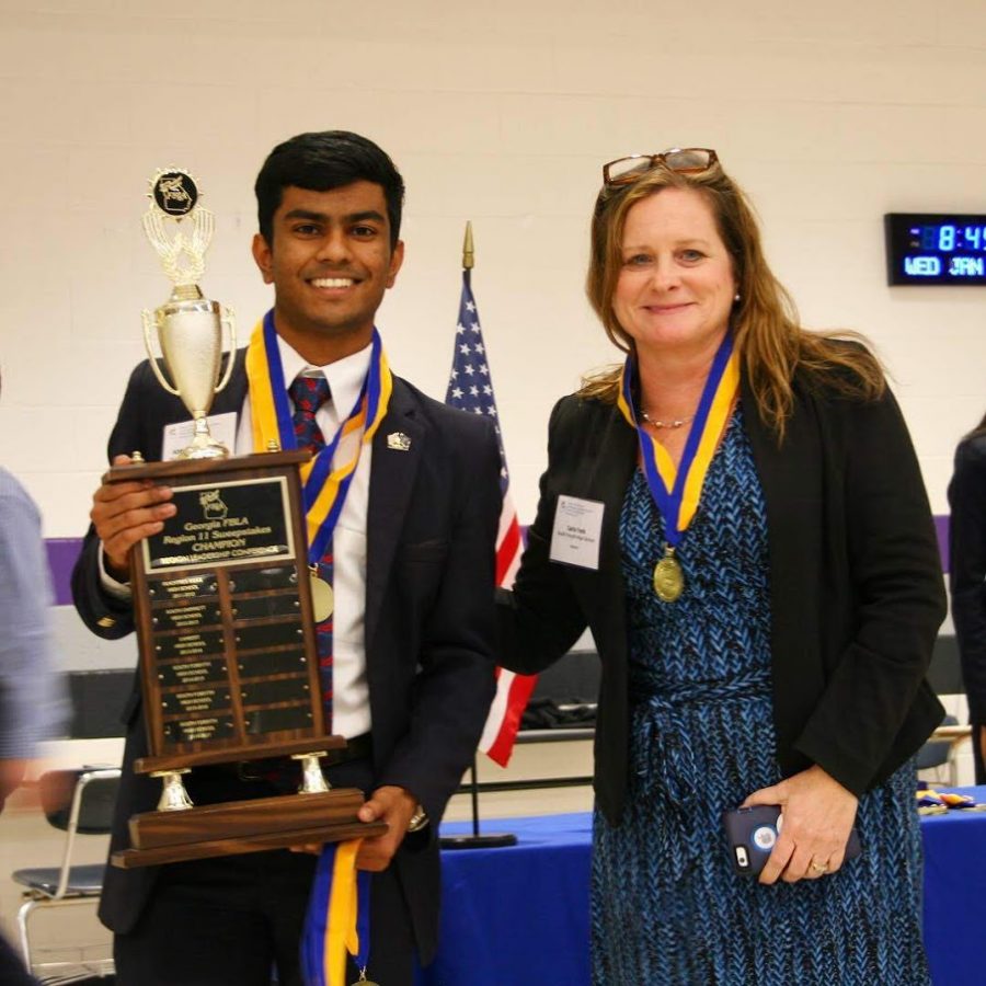 Medals in hand. Pictured is the president of FBLA, Abhay Chilakamarri, and the South Advisor for the club, Carla Yonk. They posed soon after Abhay received a first place award in his speaking event. Mrs.Yonk, an advisor at SFHS, speaks on the experience. She says: "Besides time management and networking, students can also attend workshops at the conference where they may learn new skills or have exposure to new ideas which might help them in the future. Some students also lead workshops which allows them a chance to build presentation skills among their peers." Photo used with permission from Ishika Saluja. 