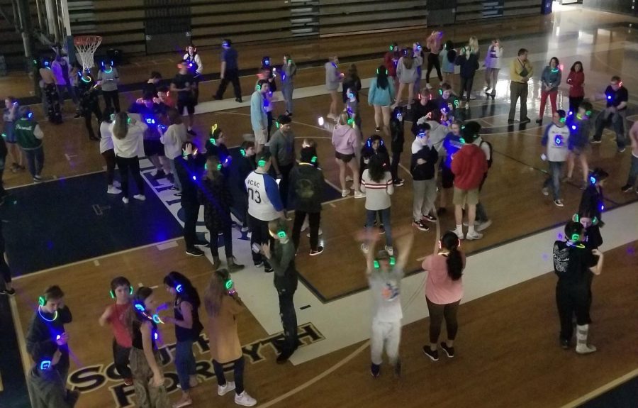 A+sea+of+colors.+Dream+on+3+continues+to+raise+funds+for+Carter+and+Carli%2C+similar+to+the+staff-student+basketball+game.+The+Silent+Disco+was+the+newest+fundraiser+for+Carter+and+Carlis+dream%2C+and+hundreds+of+students+attended+to+jam+out.