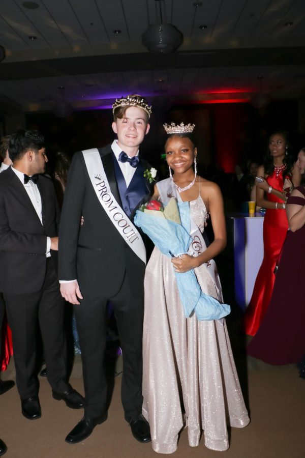 Posing+for+a+royal+photograph.+Matthew+Tesvich+and+Kiera+George+stand+side-by-side+after+accepting+their+titles+as+Prom+King+and+Queen.+Both+didnt+expect+to+receive+the+honor%2C+but+were+happily+surprised+for+the+rest+of+the+evening.