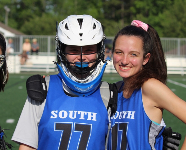 Getting ready to play. Danielle (left) and Kailyn Serbinski (right) pose for a picture before playing their last game of the 2019 season against West. Although South lost the game, they were determined to play their strongest till the second the buzzer blared, ending the game. 