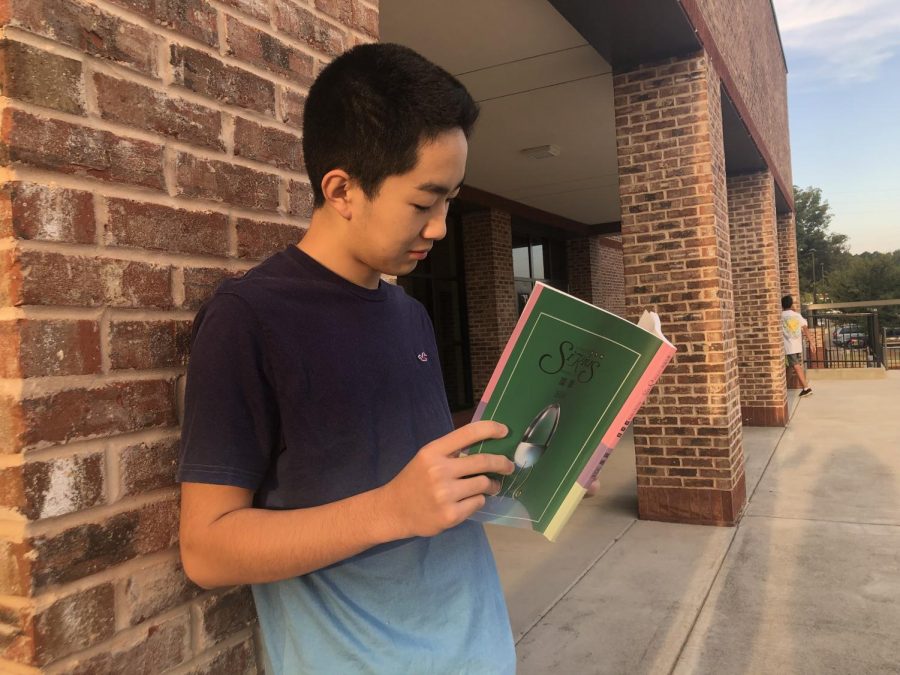 Doubling up on homework. Otani spends his time after school completing both American and Japanese school work. Though he struggled, it was required that he complete Japanese work so he would be on the same track as his other classmates.