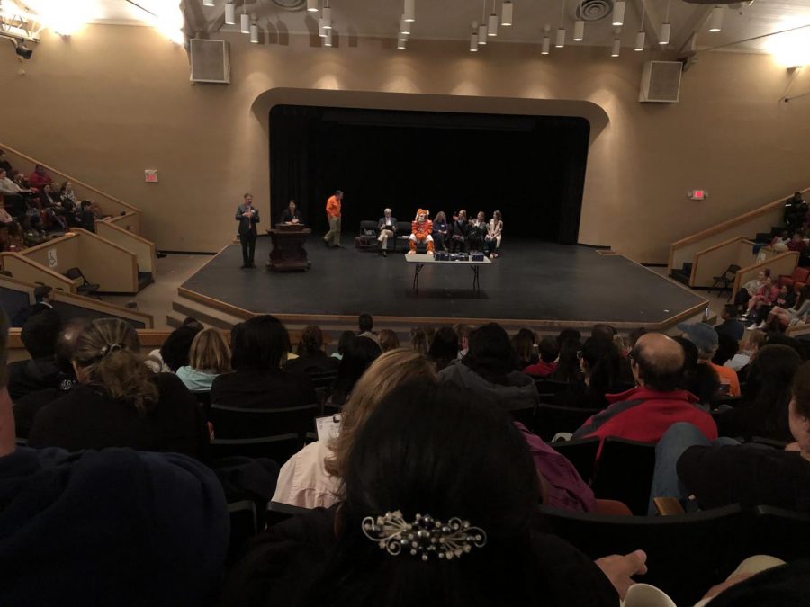 The silent auditorium. Students sit patiently in the auditorium eager to hear the outcome of their efforts. They all held their breaths as their languages were being called out.