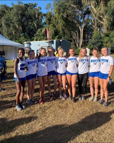 Varsity girls awards. on Saturday October 23rd, parents stood and snapped photos of everyone together after awards. Each runner led the team to a third place win. This pre-state race only adds to South's excitement for the state meet in November. 