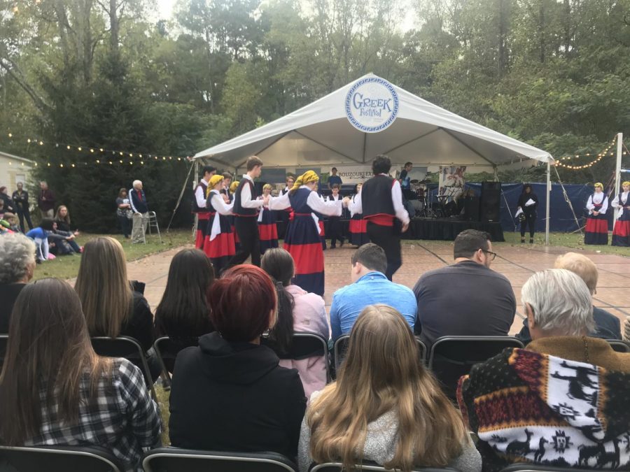 Dancing the Zorba. At the Greek festival, the Nicholas and Irene Greek Dance Troupe entertained guests with traditional Greek dances. Greek music also accompanied their dance.