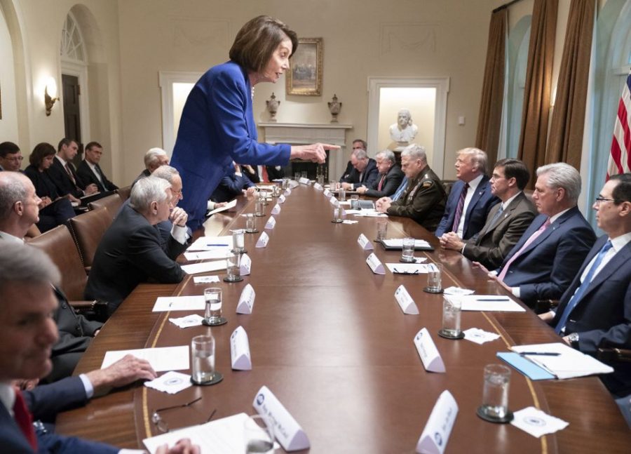 Nancy Pelosi stands up against Trump during an office meeting. Pelosi leads the charge against Trump. The debate is over the Ukraine scandal.