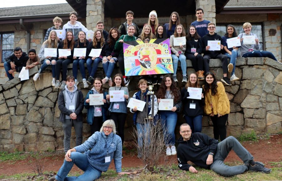 Top of the podium. The German students and teachers pose for their final group photo. They boarded the bus and drove away with their first place trophy in hand. 