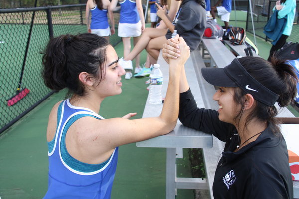 Victory. Varsity tennis player Mina Amirkhani puts much effort into her practices. Just like the Souths tennis teams, her  goal for the year is to win the state medal during this years championships.