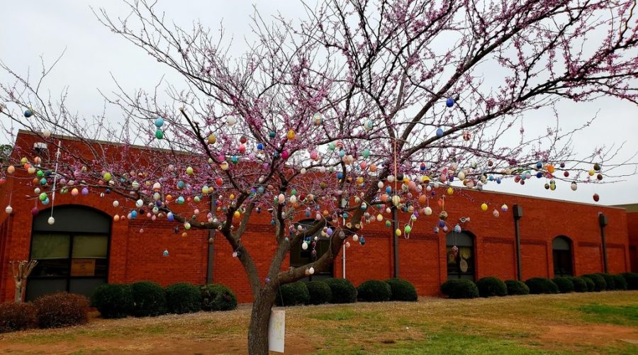Easter is here. The West Hall tree is full of colorful eggs. The German students hand painted each egg and hung them up to celebrate the Easter season.