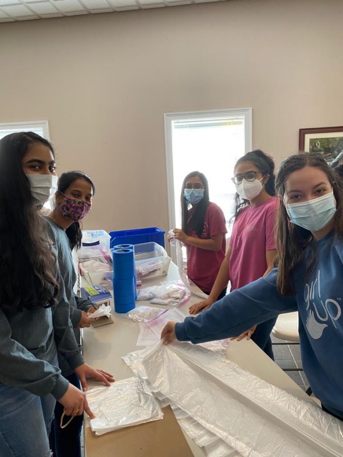 Packing supplies. As the elections round closer, Forsyth County School students volunteer to pack different cleaning materials to ensure healthy practices during the 2020 General Elections. Students have also packed different disinfectant supplies such as hand sanitizer and gloves for the poll workers as well.