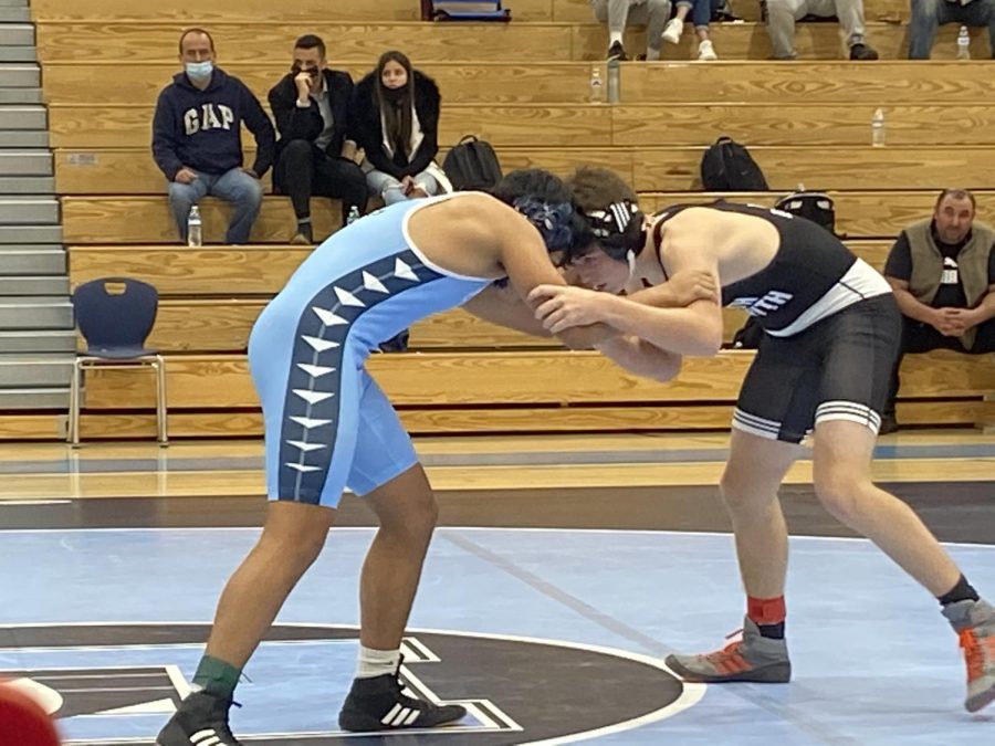 South Forsyth wrestler Finn Goss taking on Denmark wrestler Diego Gomez-Sanchez. After a quick takedown, Goss pins Sanchez in one minute and 32 seconds. This earned South Forsyth six points to the overall team score.