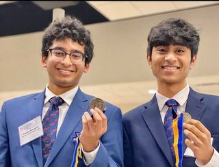 A winner's smile. Pictured are Juniors Rahav Kothuri and Abhinav Pasupuleti, posing victoriously for a photo at the 2019 State Leadership Conference. Due to the COVID-19 pandemic, the State Leadership Conference of 2020 was cancelled, students were invited to watch a live awards ceremony virtually, similar to the 2021 SLC broadcast. "We are excited to see what Georgia FBLA has in store for virtual SLC," said Rahav. "My group has worked really hard so the award ceremony is a rewarding ceremony." 