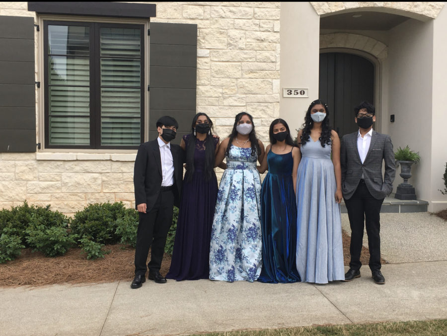 Pre-Prom fun. Juniors (left to right) Jimmy Phan, Saahithya Gutta, Ayesha Raparla, Ishita Raghuvanshi, Swetha Pendela, and Harshavardhan Jayakumar pose for a picture in the Avalon. They ate dinner at Anticos shopping center before the prom. 