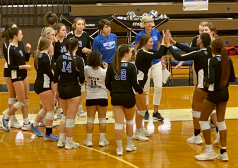 Team Support. Players come together for a huddle, and come onto the field as champions in spirit. Even though the Varsity Volleyball team may not have won the game on September 28, they still did extremely well and played hard!