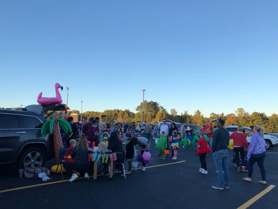 An evening full of spooky fun. South Forsyth High School hosts its annual Trunk or Treat event for families in the community in order to encourage a safe environment for the kids. The kids were beyond estastic to visit each trunk and play their game to win some extra candy.
