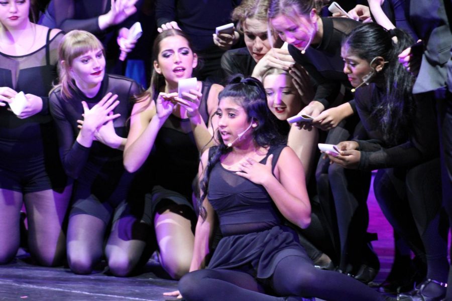 Roxies surprise. To draw the spotlight on her Roxie Hart (sophomore Arya Nayak) faints, exclaiming that she is pregnant. All the reporters and the headlines had their focus on her, and she got her trial date moved earlier.