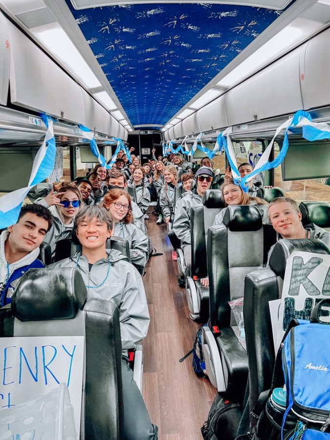 Blue and white all around. The SOFO Swim team gets on the bus, cheering each other on as they drive to their state meet. The bus was also crowded with posters to support each swimmer and encourage them as they compete.
