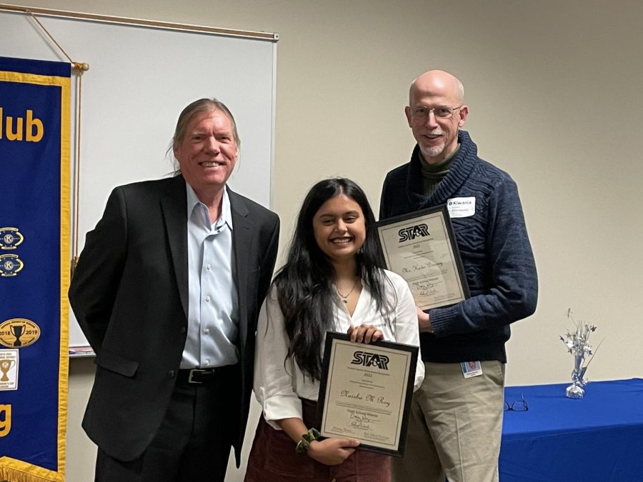 STAR Student and Teacher ceremony. (From left to right) Local sponsor, Scott Rohem gifts senior Naisha Roy and Mr. Kevin Denney with the STAR Student and Teacher awards. This banquet occurred at the University of North Georgia Cumming Campus.