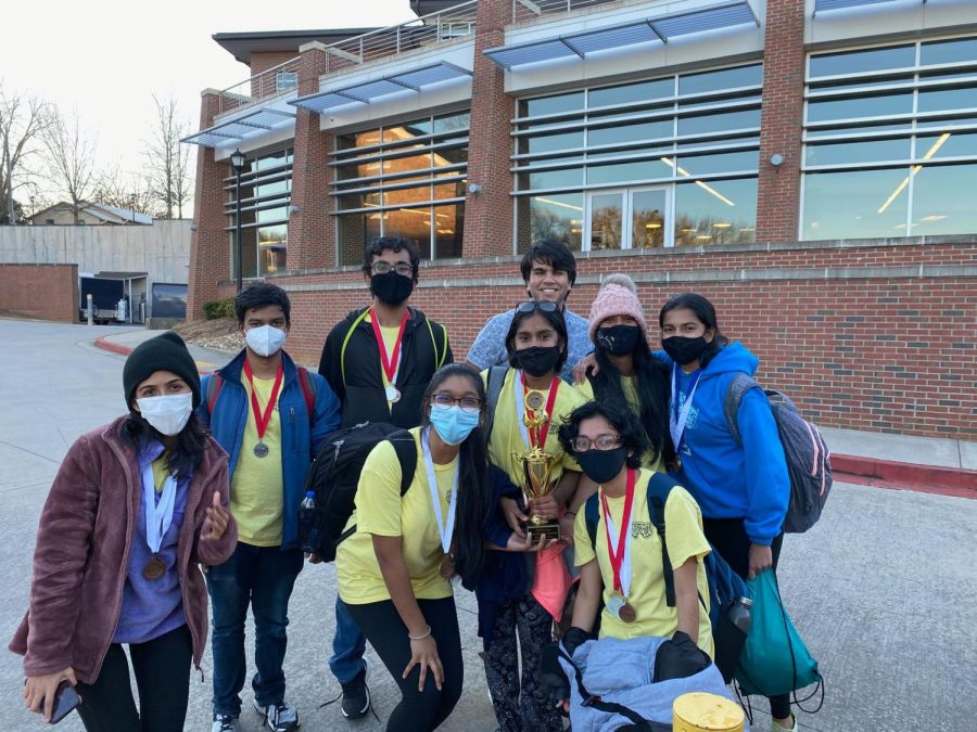 Shining medals. The senior Science Olympiad members take on their last high school Regional tournament. These members worked hard to place in top ten for each of their events.