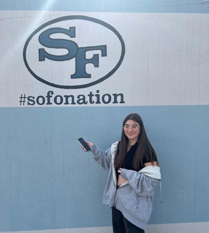 Samsung or Apple? SFHS sophomore Luana Pompei shows off her new Samsung Z Fold in SOFOs plaza. She told The Bird Feed that her Samsung device is unique and thats why she likes her phone.