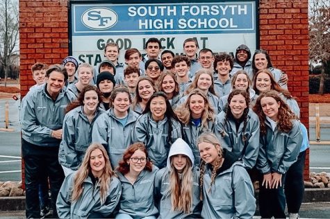 Swimming into victory. South Forsyths Swim team smiles bright as they prepare to compete at their state championship. All the swimmers were very excited to showcase their skills as they went into the weekend.