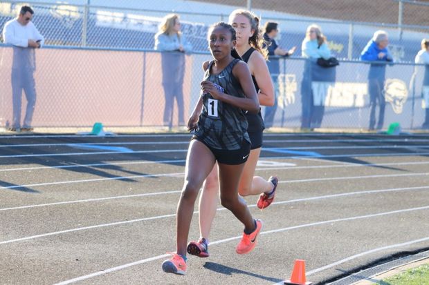 South and Lambert. In the 1600, junior Carmel Yonas runs in front of junior Bella Cammarota as they race for first place. In the end, Yonas won by .54 milliseconds and sophomore Isabel Yonas placed third.