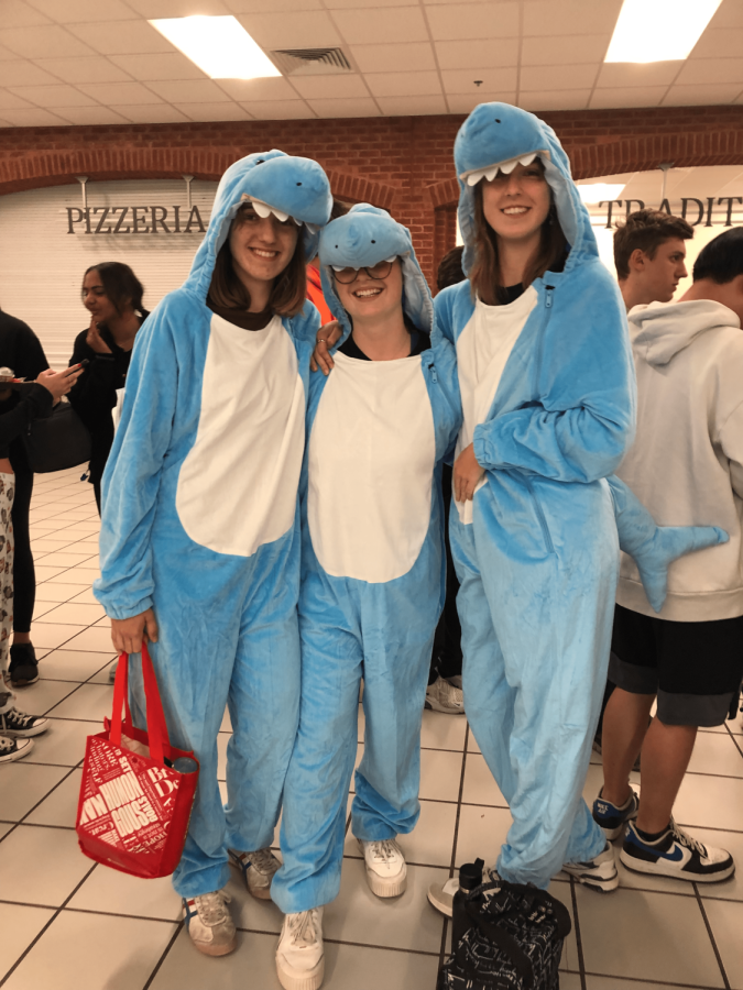 German+Exchange+Students+dress+up+for+Pajama+Day.+During+HOCO+Week+spirit%2C+the+German+Exhange+Students+dressed+up+in+matching+shark+onesies+for+Pajama+Day.+%28Maggie+Craig+%2F+The+Bird+Feed%29