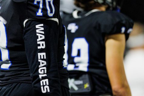 Before kick-off, Senior athletes lined up to be celebrated at the final football game of the 2022 season. The War Eagles were ultimately victorious against West Forsyth, clinching a spot in the statewide playoffs. (Brady Lynn / The Bird Feed) 
