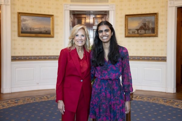 Posing for a picture. First Lady Jill Biden and Pragathi Kasani-Akula participated in the photo line at the Girls Leading Change Event. This event honors young female changemakers around the nation.