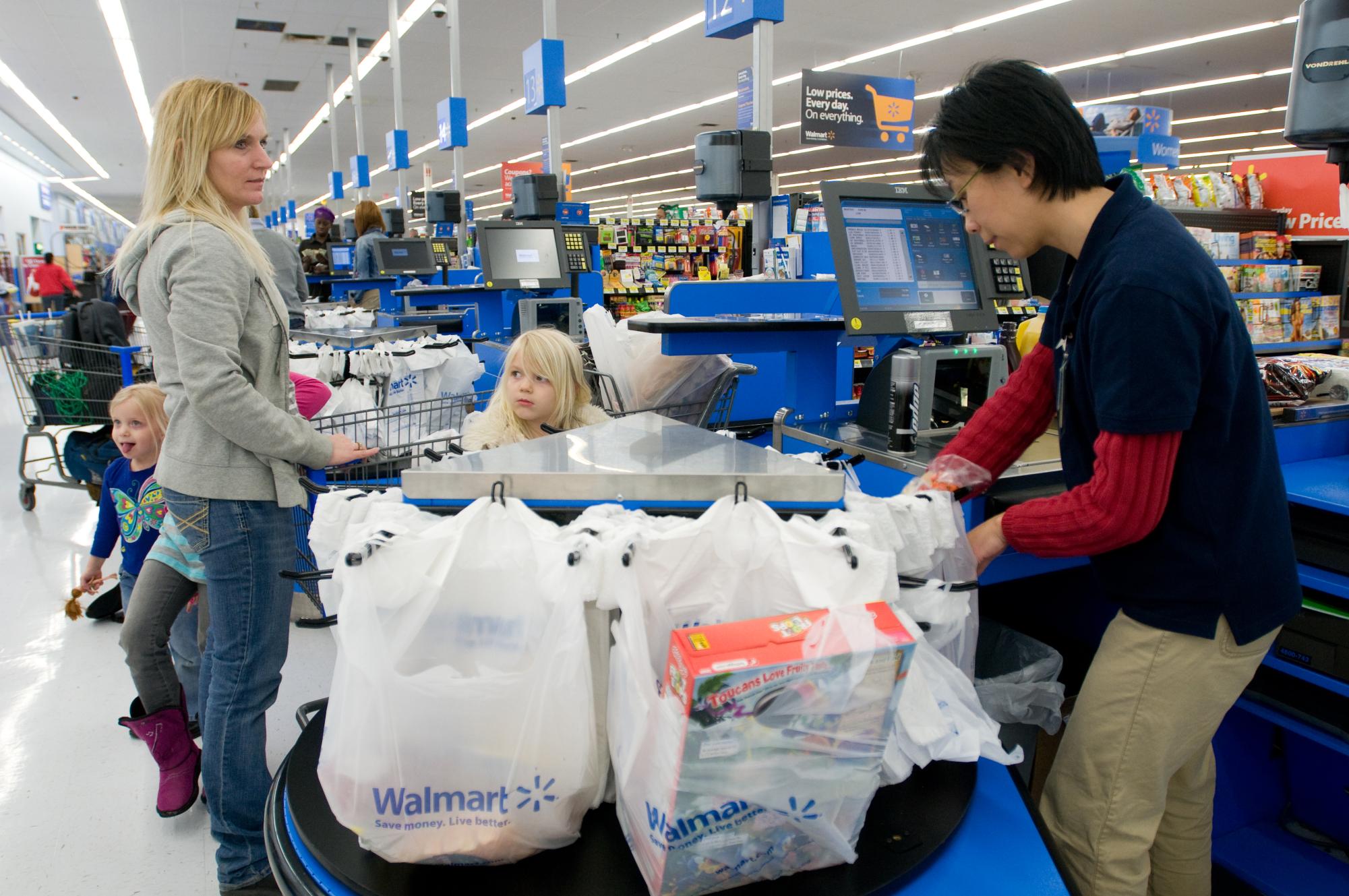 "Walmart Grocery Checkout Line in Gladstone, Missouri" by Walmart Corporate is licensed under CC BY 2.0.